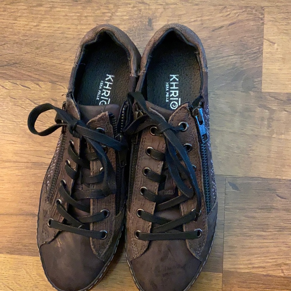 Designer Sneakers; gently worn, sporty and classy design.